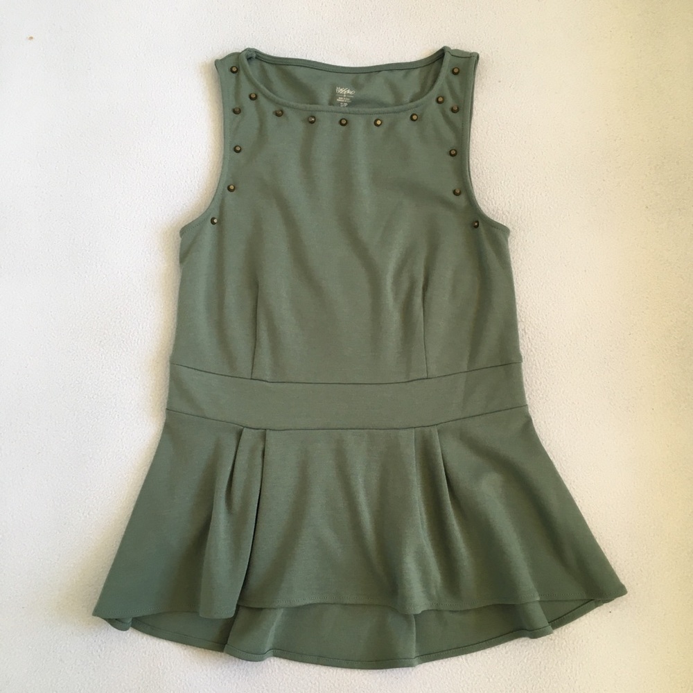 Green sleeveless embroidered peplum top work